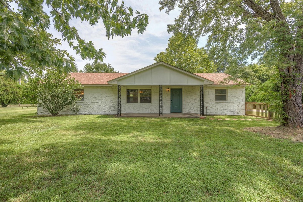 Pending: stone ranch under a shade tree